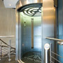 Elevator with semipanoramic cabin